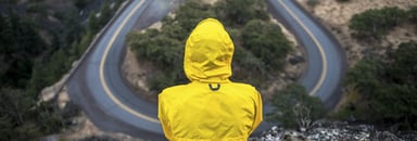 person in a yellow rain jacket