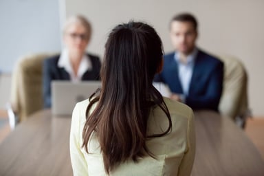 person being interviewed by two people