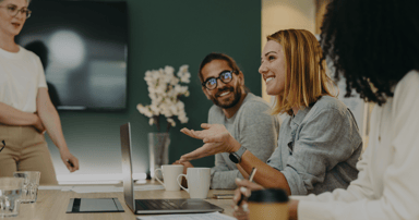 people chatting during a meeting