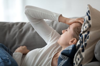 person sick on the couch