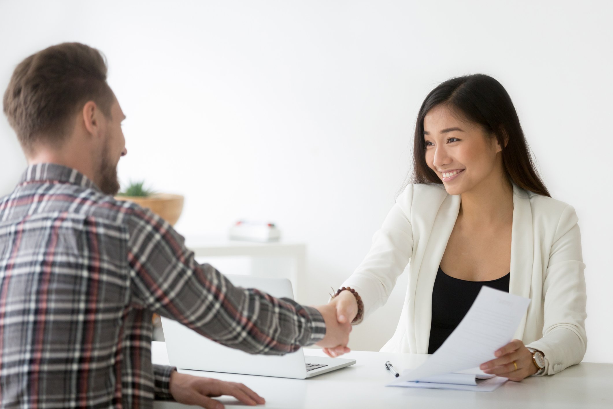 recruitment officer shaking hand with candidate