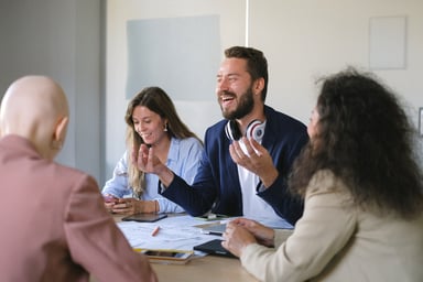 people chatting during a meeting